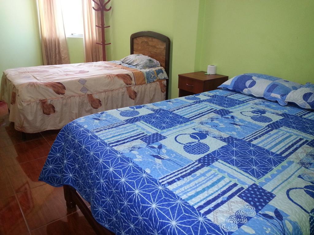 Hostal Puerto Ingles Іло Номер фото